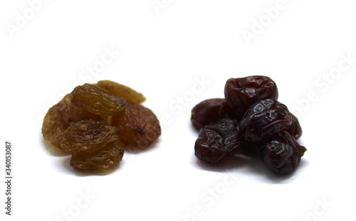 Wallpaper Mural Raisins and dried cranberries isolated on white background Torontodigital.ca