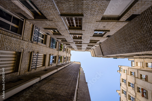 Bilde på lerret Paris, France 2017 - Blue sky looking through a local quarter, autumn with sunshine and mild wind