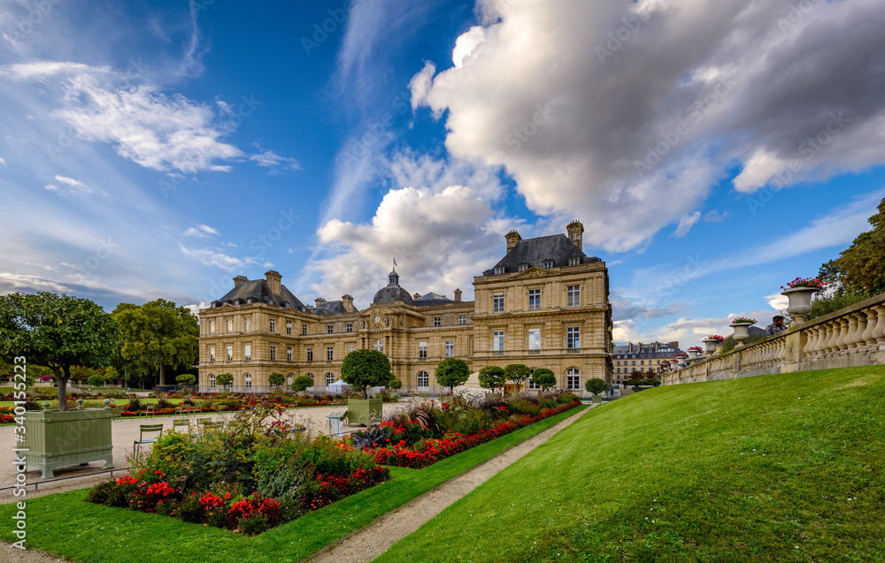 Luxembourg Palace, Paris - Inside Luxembourg Garden walk, with flower plants, lake and swans 