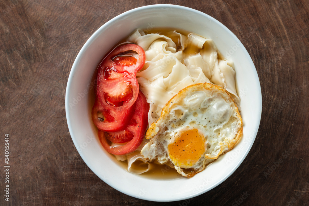 Chinese Traditional noodles with tomatoes and eggs Chinese Traditional noodles with tomatoes and eggs