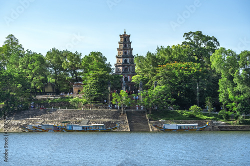 The Thien Mu Pagoda is one of the ancient pagoda in Hue city.It is located on the banks of the Perfume River in Vietnam's historic city of Hue. Thien Mu Pagoda can be reached either by car or by boat. photo