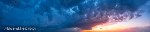 Dramatic Panoramic View of a cloudscape during a cloudy and colorful sunset. Taken over Cuba. © edb3_16