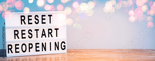 Foto Words reset, restart and reopening on the light box