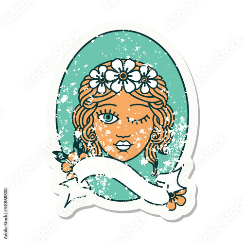 grunge sticker with banner of a maiden with crown of flowers winking