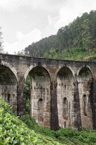 The famous nine-arch bridge of the railway in the jungle in Sri Lanka