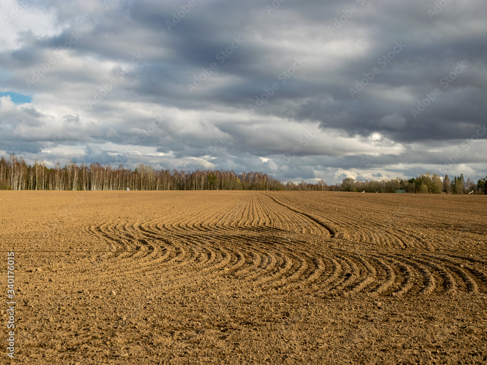 cultivated field, a freshly tilled field