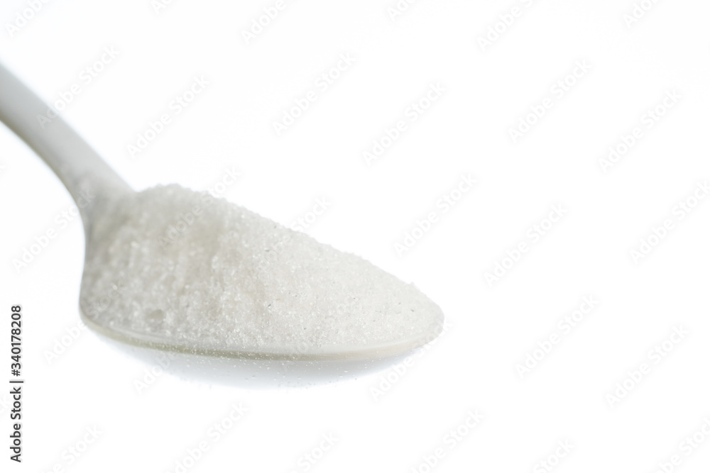 milk powder in a spoon close up shot isolate in white backgroud milk powder in a spoon close up shot isolate in white backgroud