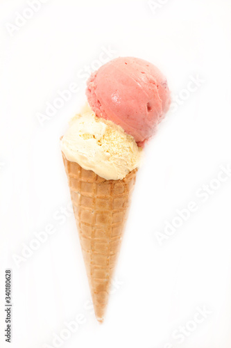 vannilla and strawberry ice cream in cone on white background