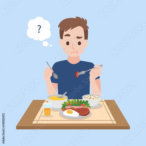 Tasteless, A Upset man eating food that is tasteless of corona virus Symptoms, Health care concept.