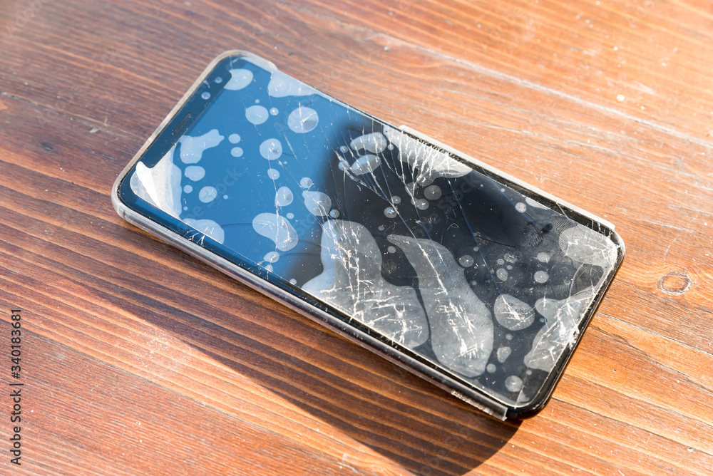 Smartphone with broken glass Smartphone with broken glass