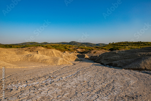 arid and cracked hill on muddy volcanoes