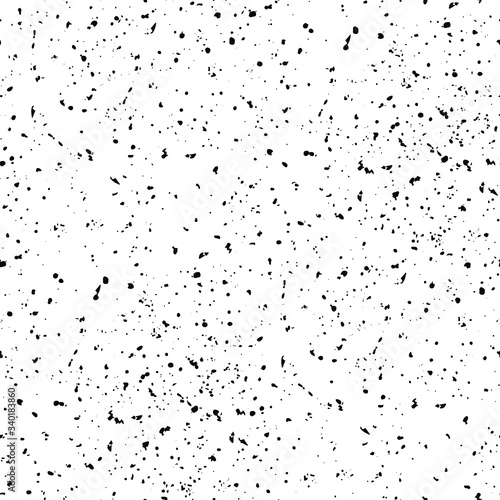 Grainy seamless pattern, texture, background. Black speckles.