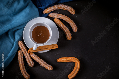 Churros with sugar and chocolate sauce