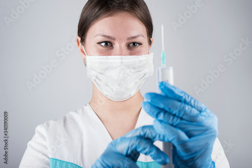 Syringe, medical injection in hand, palm or fingers. Medicine plastic vaccination equipment with needle. Nurse or doctor. Liquid drug or narcotic. Health care in hospital.