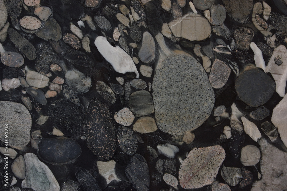 Granite with different stones in black and gray shades of color, a natural stone called Nero Marinace Granite with different stones in black and gray shades of color, a natural stone called Nero Marinace