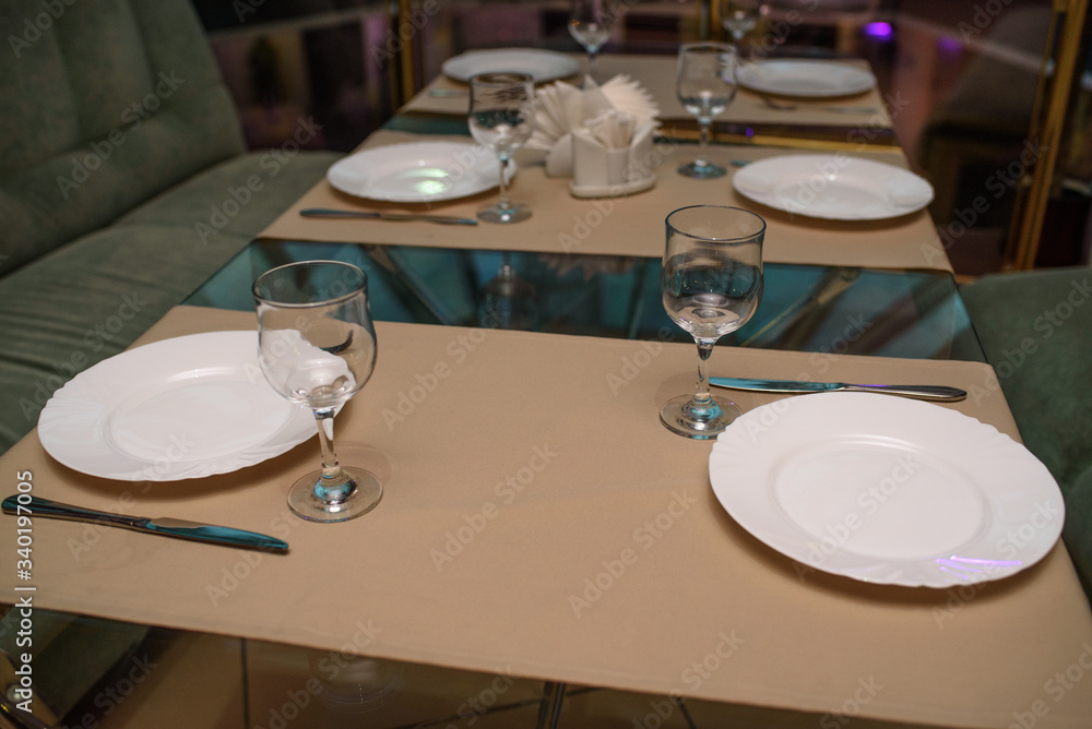 Laid table for restaurant guests. Laid table for restaurant guests.