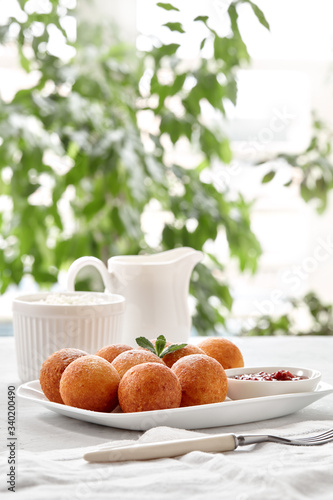 Wallpaper Mural Beautiful breakfast. Cottage cheese donuts  balls  on a light background. Torontodigital.ca