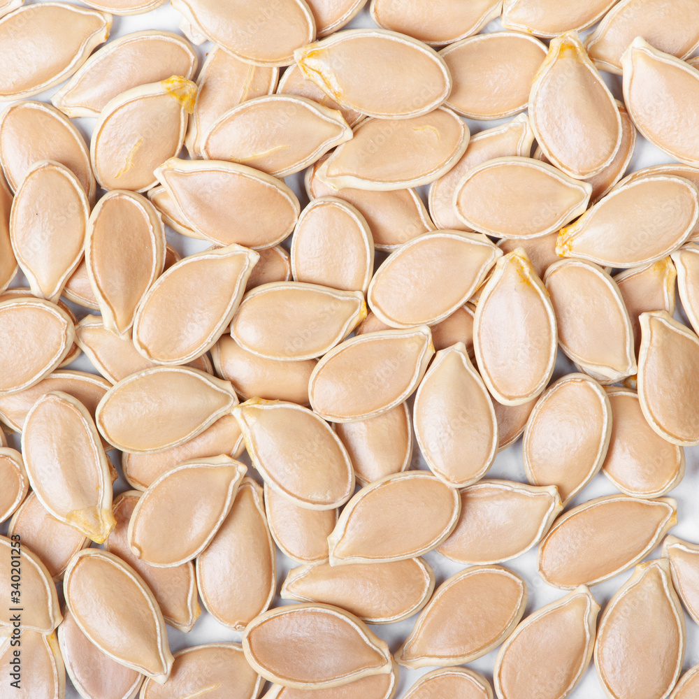 Background full of pumpkin seeds Background full of pumpkin seeds