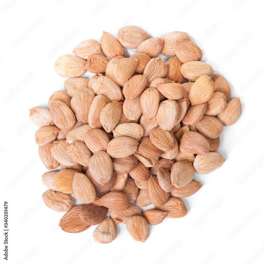 Obraz premium Handful of peeled apricot kernels