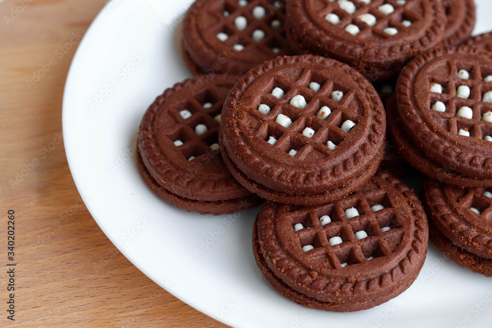 Chocolate cookie with milk layer, close-up cookies Chocolate cookie with milk layer, close-up cookies