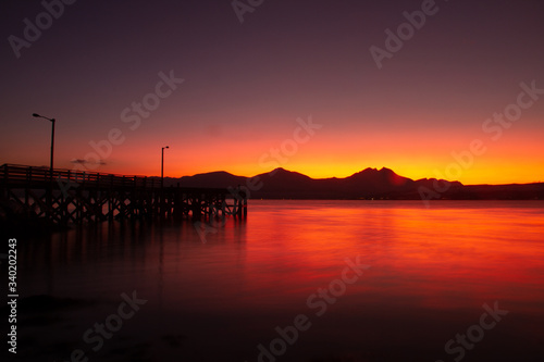 sunset, sky, sun, sunrise, nature, clouds, landscape, evening, light, sea, cloud, blue beautiful, horizon, red, sunlight, mountain view, ocean tromso tromsø water travel tourism sea coast nature 