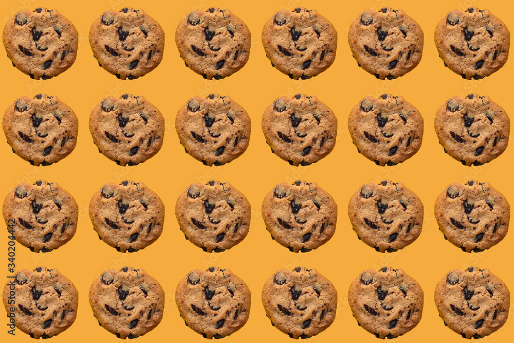 Fototapeta premium Pattern of American cookies with a chocolate crumbs
