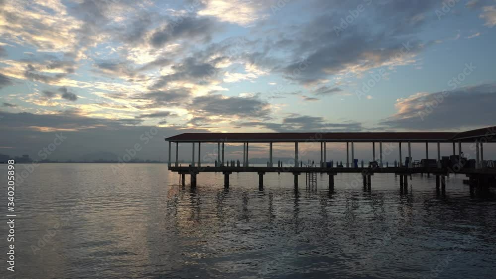 Panning fisherman jetty at Karpal Singh Drive in sunrise morning. Panning fisherman jetty at Karpal Singh Drive in sunrise morning.