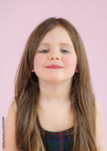 portrait of little model girl in studio