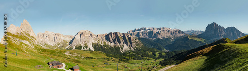 Amazing panoramic view in the Dolomites mountains. Views from Seceda over the Odle rocks are spectacular. Beautiful aerial shot of the valley. Italian nature horizon landscape. Freedom concept.