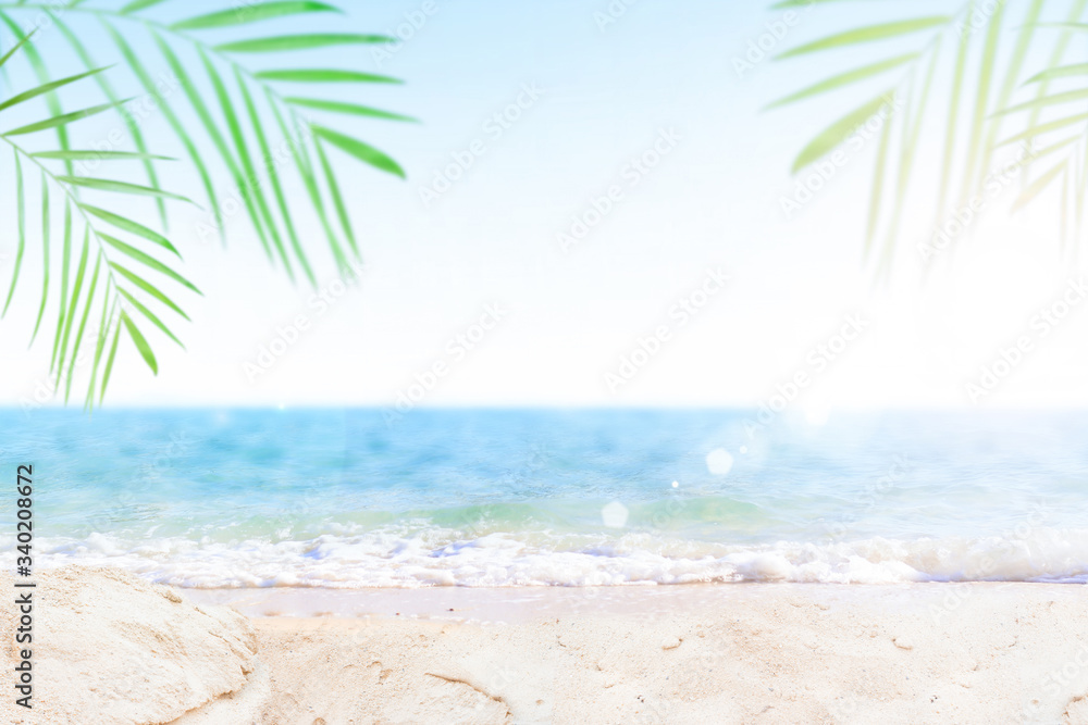 Sand with blurred Palm and tropical beach bokeh background, Summer vacation and travel concept. Copy space