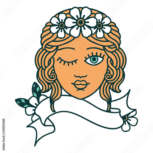 tattoo with banner of a maidens face winking