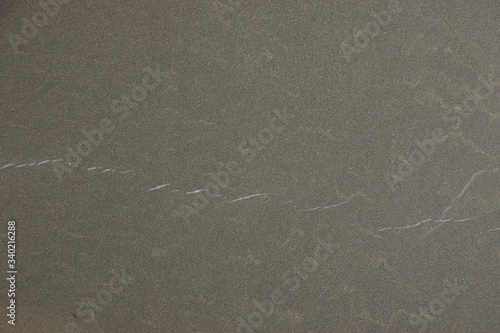 Pietre Piasentina granite with hardened gray-brown pattern
