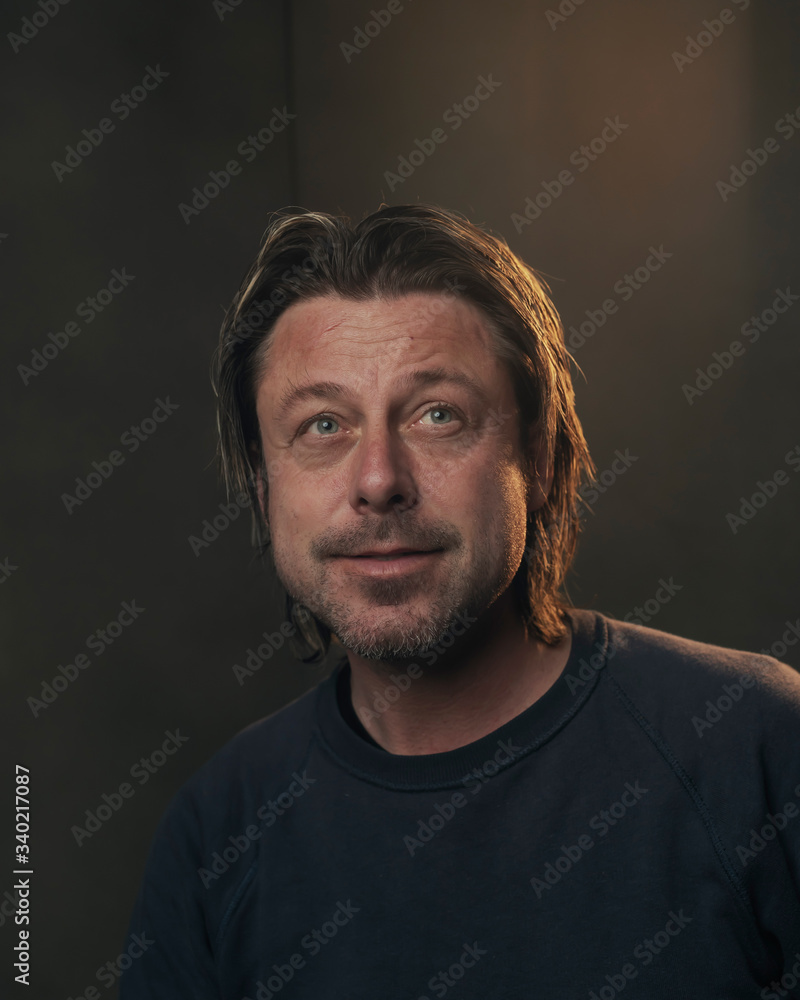 Studio portrait of a smiling european man. Studio portrait of a smiling european man.
