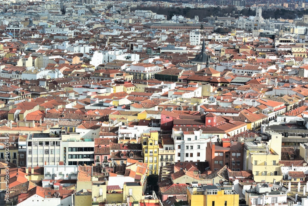 Aerial Madrid (Spain) perspective view with the rooftops of the old part of the city in the foreground