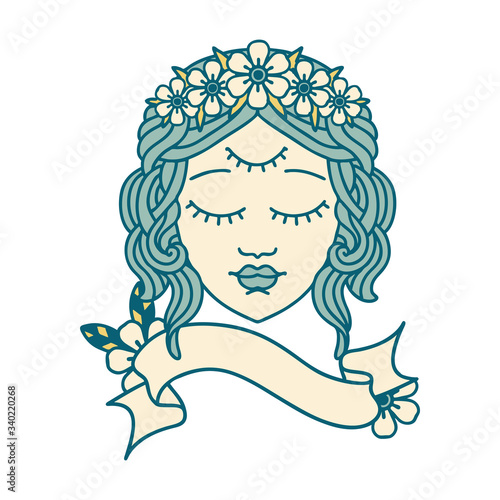 tattoo with banner of female face with third eye
