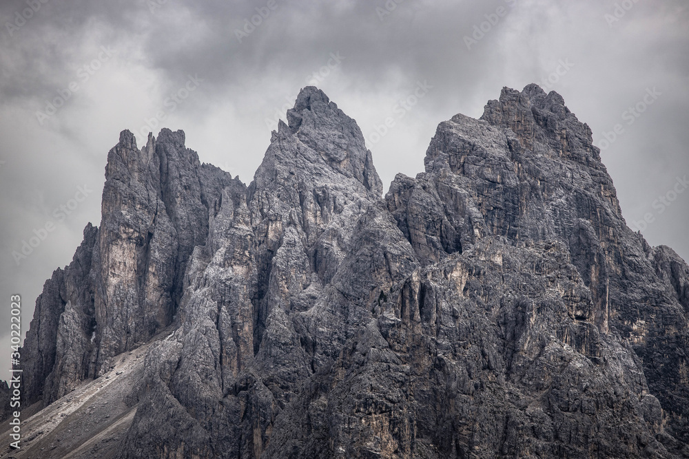 Moody picture of Cadin di Misurina mountains, covered in clouds in bad weather. Cortina d'Ampezzo, Italy