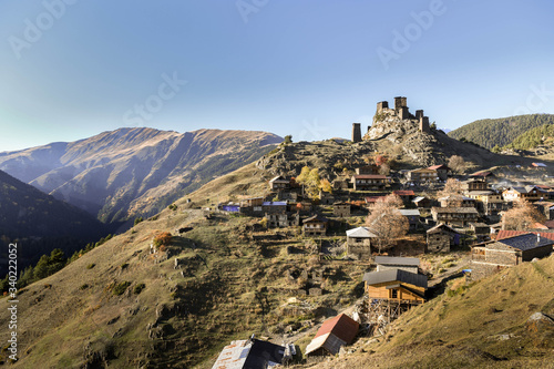 The old fort overlooks the village of of upper Omalo at sunset photo