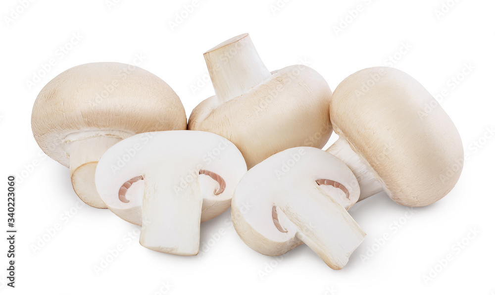 Fresh mushrooms champignon and half isolated on white background with clipping path