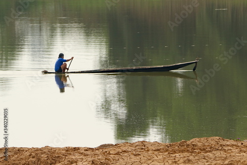 man in canoe