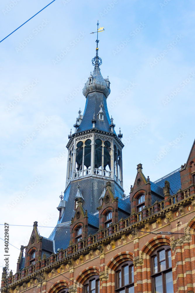 Beautiful architecture of Magna Plaza shopping center, the former main post office in Amsterdam, Netherlands 