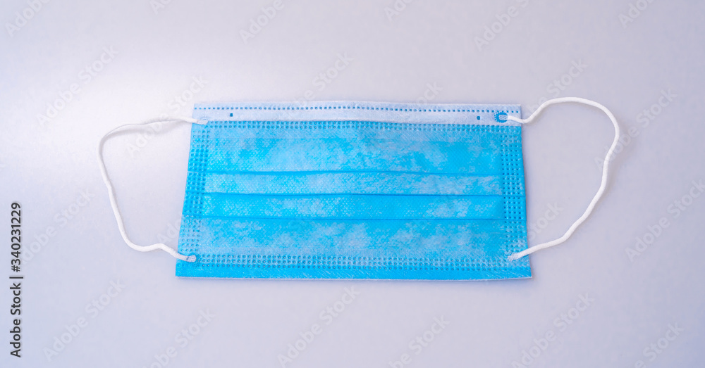 Blue medical face masks isolated on white Blue medical face masks isolated on white