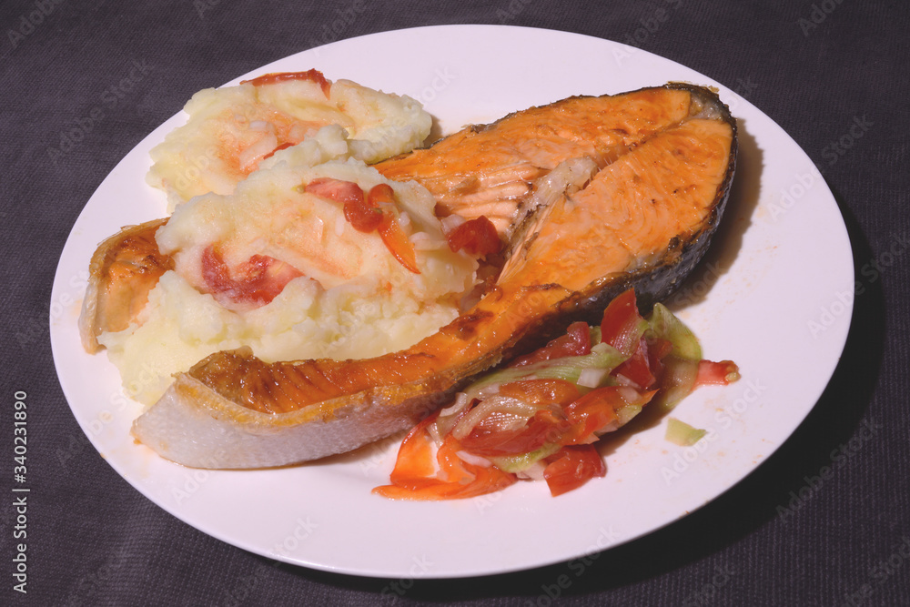 Fried red salmon fish with vegetables Fried red salmon fish with vegetables