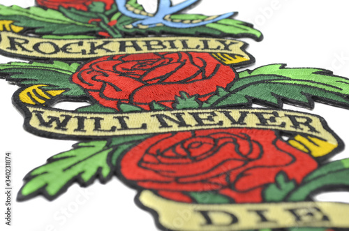 The embroidered patch. Attributes for bikers  rockers and metalheads. Patch with roses. Rockabilly will never die.