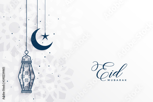 islamic eid festival greeting with lamp and moon photo