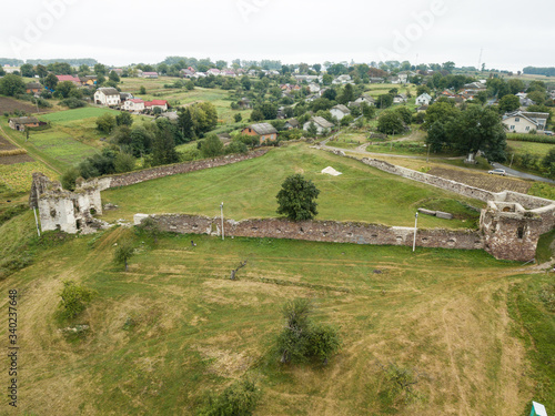 Aerial view to ruined castle in Pidzamochok, Ukraine photo