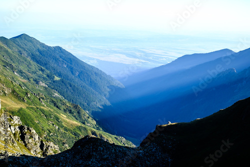 Sunrise on Fagaras high mountain ridge. Romanian mountain landscape with high peaks over 2200m