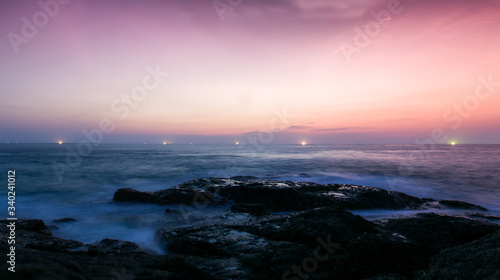 Sunset over the ocean with dramatic sky