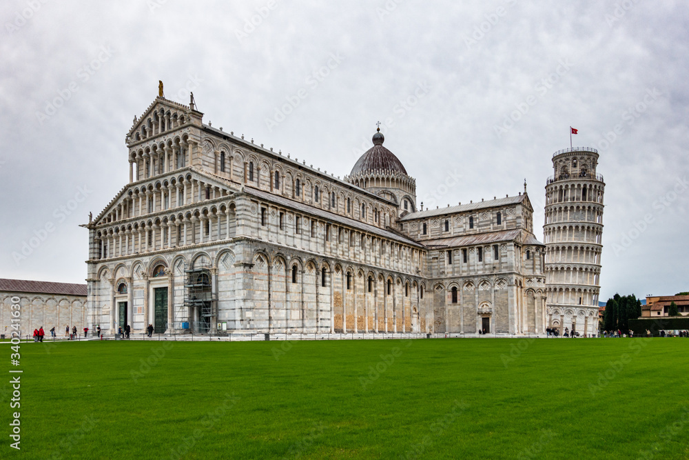 The beautiful Pisa Cathedral, a notable example of Romanesque architecture with the famous  Leaning Tower of Pisa, Tuscany, Italy.