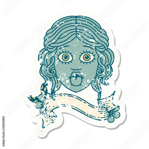 grunge sticker with banner of female face sticking out tongue