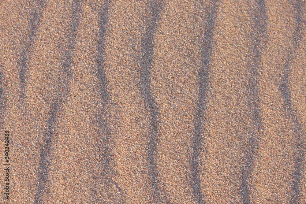 Sand wave pattern background, Africa, close-up Sand wave pattern background, Africa, close-up